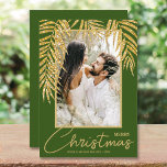Tropical Christmas Photo Feiertagskarte<br><div class="desc">Glamorous faux gold glitter palm fronds highlight your favorite photo on these holiday dark green background Christmas photo cards. Select Matte for heaviest paper and high definition for best quality.</div>