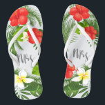 Tropical Floral Mrs. Bride ID475 Flip Flops<br><div class="desc">Erschaffen Sie besondere Flipflops für die Braut mit diesem schönen Design mit üppigem tropischem Blattwerk und farbenfrohen Blumenakzenten. Das auffällige 'mrs' Skript ist optional und kann gelöscht werden, um die Vorlage für andere Anlässe zu verwenden. Suchen Sie nach ID475, um weitere Produkte mit diesem Design zu sehen, inklusive der passenden...</div>