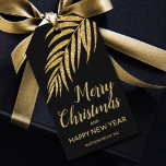 Tropical Gold Glitter Palm Christmas Thank You Geschenkanhänger<br><div class="desc">Fügen Sie Ihrem Geschenk eine Touch mit individuellen, bedruckten Geschenketiketten hinzu. Glamouröse, elegante goldene Glitzer tropische Palmen Frond auf schwarzem Hintergrund mit Ihrem Gruß und Infos in schicken Schriften. Klicken Sie auf die Schaltfläche PERSONALISIEREN, und klicken Sie dann auf Weitere Verknüpfung anpassen, um Text zu ordnen, hinzuzufügen oder zu löschen;...</div>
