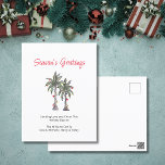 Tropical Palm Trees Beach Weihnachtsvorstellung Feiertagspostkarte<br><div class="desc">Tropical Beach Weihnachtskarte,  mit einer Illustration von Palmen und anpassbarer Typografie. Eine festliche Art,  Urlaubswünsche an Freunde und Familie aus den Tropen zu senden.</div>