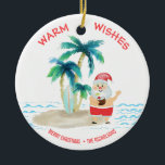 Tropical surfing Santa Beach Warme wünscht Weihnac Keramik Ornament<br><div class="desc">Santa nimmt einen dringend benötigten Urlaub und lebt das gute Leben, surfen und entspannen auf einem tropischen Inselstrand. Er hat seine Zehen im Sand got, einen Drink in der Hand, Palmen und eine warme Meeresbrise. Die Begrüßung "Warme Wünsche" ist in einer hübschen Korallenfarbe über der Oberseite. Personalisieren Sie Ihren Urlaub...</div>
