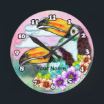 Tropical Toucans  Runde Wanduhr<br><div class="desc">Tropical Toucans clock by ArtMuvz Illustration. Matching toucans apparel and beach gifts. To personalize  add your name or add text instead. Customize this  Toucan clock to make it uniquely yours or to give as a personalized gift</div>