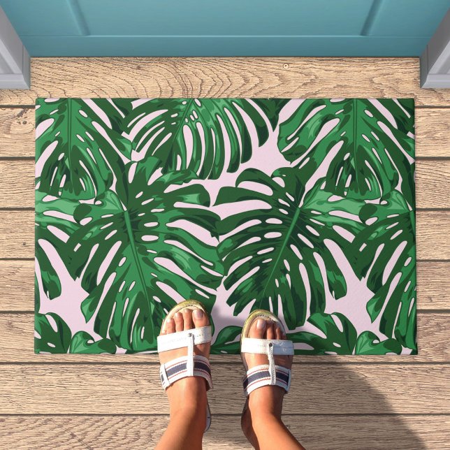 Tropisch-grüne Pink-Dschungelbäume-Blätter Fußmatte (Doormat with green palm leaves on pale pink background)