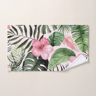 Tropische Blätter und Blume in Rosa Handtuch