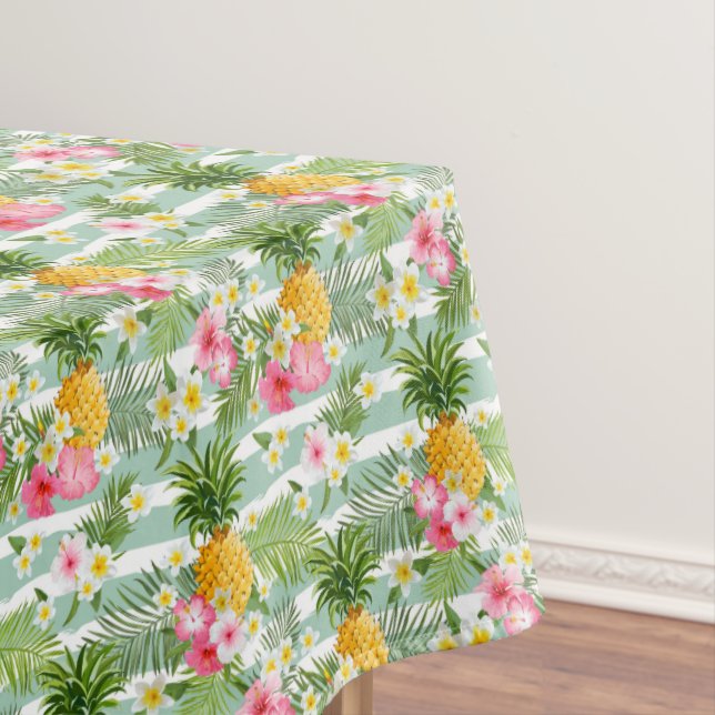 Tropische Blumen u. Ananas auf aquamarinen Tischdecke (Beispiel)