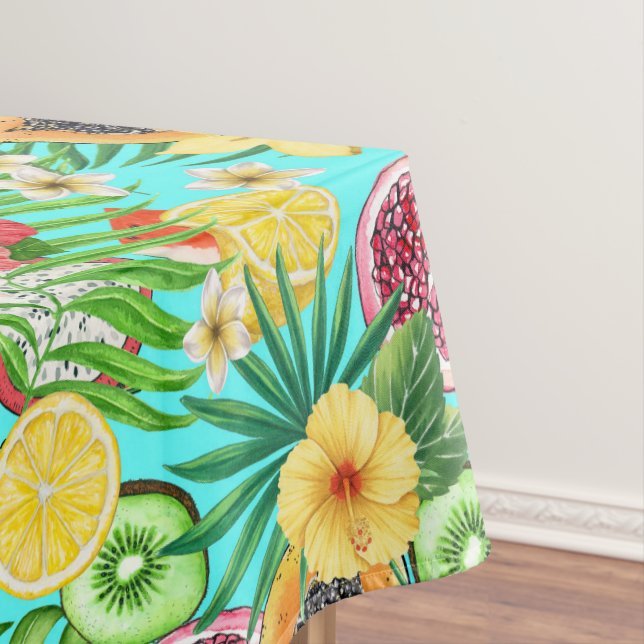 Tropische Mischfrüchte, Blume und Blätter auf blau Tischdecke (Beispiel)