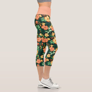 Tropische orange und grüne Blumen Blumenmuster Capri Leggings