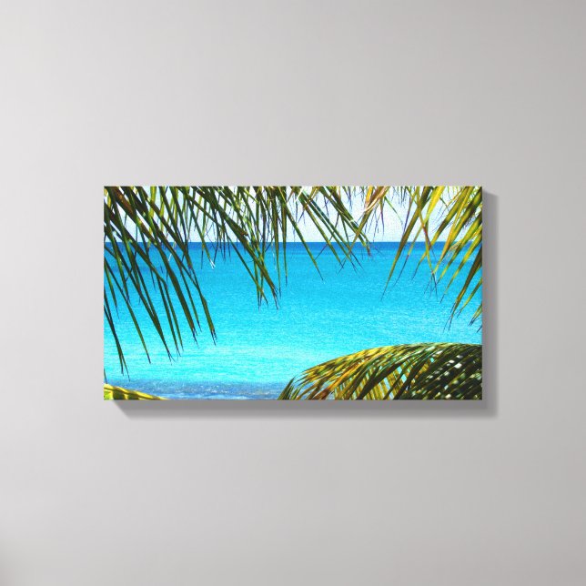 Tropischer Strand gerahmt mit Palmfronten Leinwanddruck (Vorderseite)