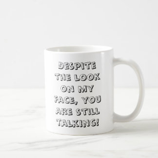 Trotz des Blickes auf meinem Gesicht, sind Sie Kaffeetasse