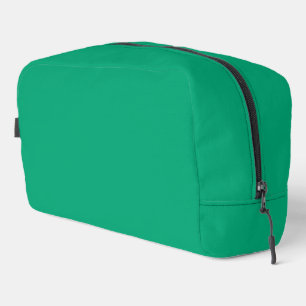 Trousse De Toilette Fond sarcelle uni avec une texture lisse