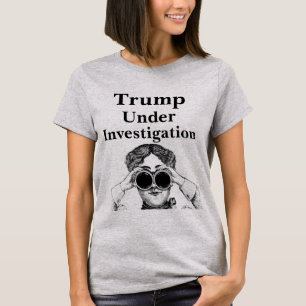 Trump befindet sich im T - Shirt der Untersuchung