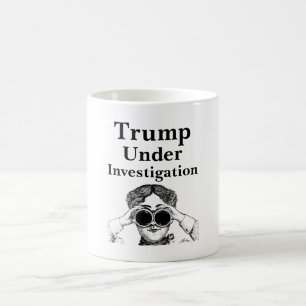 Trump befindet sich unter der Tasse des Ermittlung