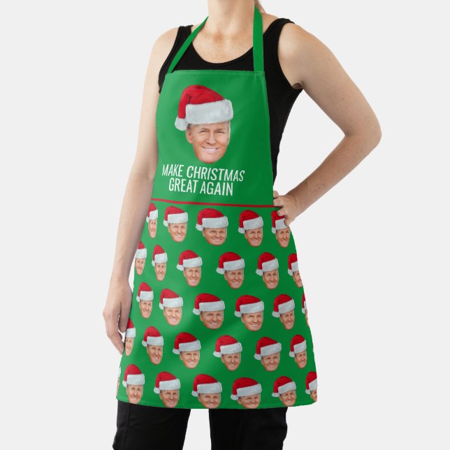 Trump mit Weihnachtsmannmütze - Weihnachten wieder Schürze (InSitu)
