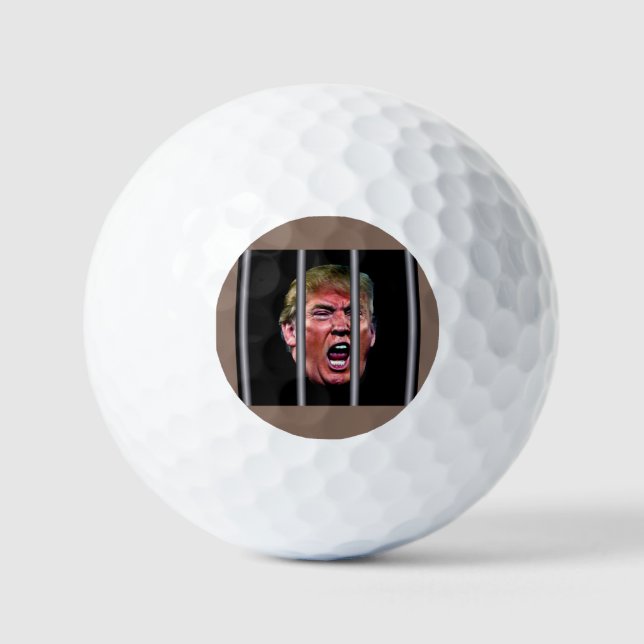Trumps glänzender Kopf hinter Gefängnisbars Golfball (Vorderseite)