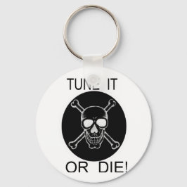 Tunen Sie es oder Die Sie den Kreisschädel Schlüsselanhänger