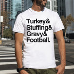 Türkei & Stuffing & Gravy & Football Erntedank T-Shirt<br><div class="desc">Unser Blick auf das Ampersand-Shirt listet alle Lieblingssachen über Erntedank auf...  Truthahn,  Füllen,  Gravy und Fußball! Erhältlich in Männer-,  Frauen- und Kinderstilen. Coordinierendes Zubehör auch in unserem Shop erhältlich!</div>