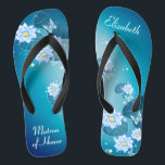 Türkisblaues Muster Matron of Honour Gedreht Flip Flops<br><div class="desc">Dieses hübsche Blau zeichnet sich durch elegante Lotus-Blume im türkisblauen Farbverlauf aus. Fügen Sie Ihre Formulierung hinzu, um einfach Ihre eigenen schönen Hochzeitsflip Flops, um eine stilvolle Dosis Glanz zu Ihrem Hochzeitstag, Junggeselinnen-Abschied, oder anderen Feiern hinzuzufügen. Strich Anpassen Sie es mit Ihrer Formulierung durch die Vorlagenfelder. Wenn Sie gewollt haben,...</div>