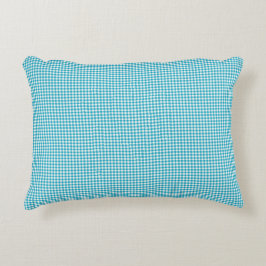 Turquoise gingham pillow displayed on a neutral  dekokissen
