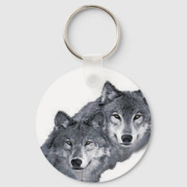 Two beautiful wolves, on a keychain schlüsselanhänger