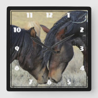 Two Brown Wild Horses Nuzzling