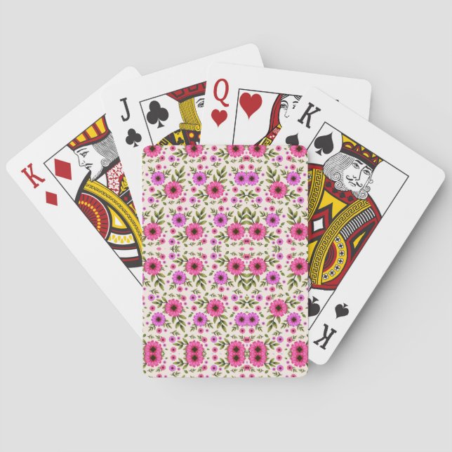 Two images showing playing cards with a floral  spielkarten (Rückseite)