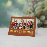 Typografie Foto Collage Terracotta Weihnachten<br><div class="desc">Frohe Weihnachten! Mit dieser individuell gestaltbaren Weihnachts-Foto-Collage-Karte können Sie sich in dieser Saison Ihre Wünsche mitteilen. Es zeichnet sich durch einfache Typografie auf Terrakotta-Hintergrund aus. Personalisieren Sie Ihre Daten durch Hinzufügen von drei Fotos, Namen, Jahr und anderen Details. Diese goldene Weihnachtskarte ist in anderen Farben und in einem Karton erhältlich....</div>