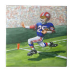 Überqueren der Ziellinie für einen Touchdown Fliese<br><div class="desc">Hören Sie, wie die Menge brüllt, während sie ihren Lieblingsfußballspieler beim Überqueren der Tor-Linie für einen Touchdown sehen! Jay Throckmorton malte diese dynamische Szene. Kaufen Sie eine Kopie für sich oder geben Sie sie als Geschenk an den Fußballfan in Ihrem Leben!</div>