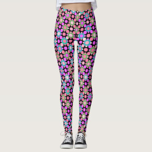 Überschneidende Polka Dots in Rosa und Grün. Black Leggings