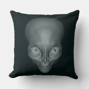 UFO-Alien wirft Kissen