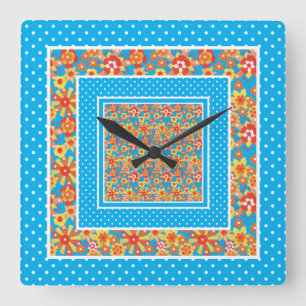 Uhr, orangefarbene Blume, blaue Polka-Punkte Quadratische Wanduhr