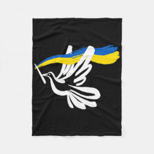 Ukrainische gelb-blaue Flagge mit weißer Taube unt Fleecedecke