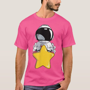Un astronaute attrape un T-shirt étoile jaune
