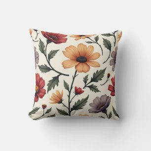 Un coussin coussin au joli design fleuri