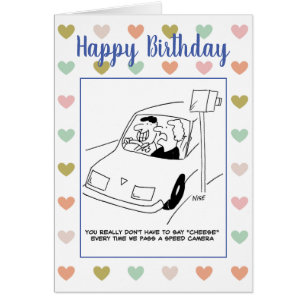 Un homme dit "fromage" en train de passer une camé