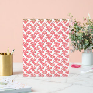 un motif à fleurs rouge et blanc sur fond blanc