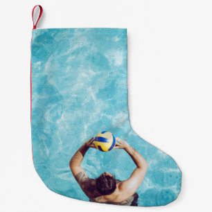 Unbekannte Person spielt Beachvolleyball Kleiner Weihnachtsstrumpf