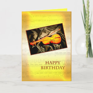 Une carte d'anniversaire musicale avec un violon
