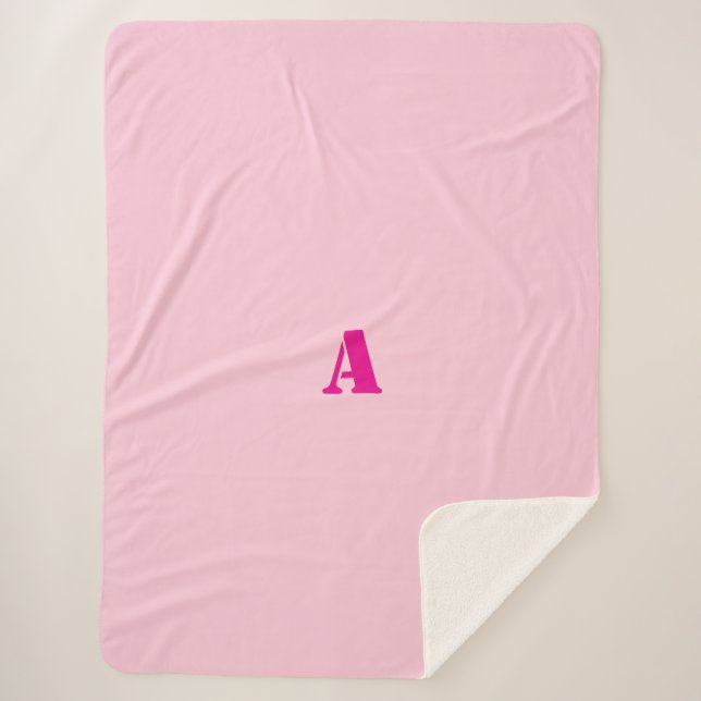 Une couverture en toison rose monogramme (Devant)