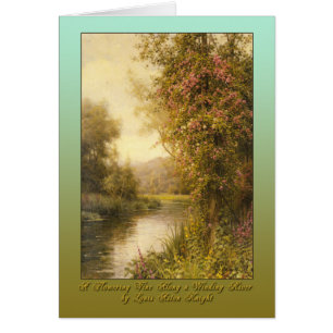 Une vigne fleurissante le long d'une rivière