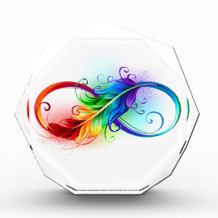 Unendliches Symbol mit Regenbogenfederhalter Fotoblock