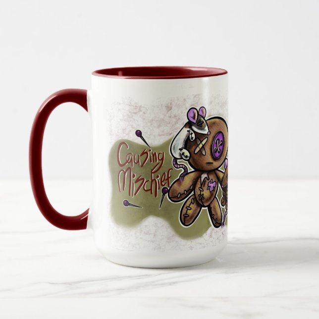 Unheil anrichtender Becher Tasse (Links)