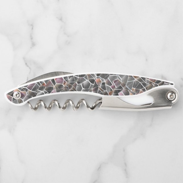 Unordnung von grobem Lachs und grauem Mosaik Kellnermesser (Rückseite)