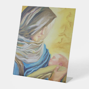 Unsere Dame des Schweigens hält das Baby Jesus Sockelschild