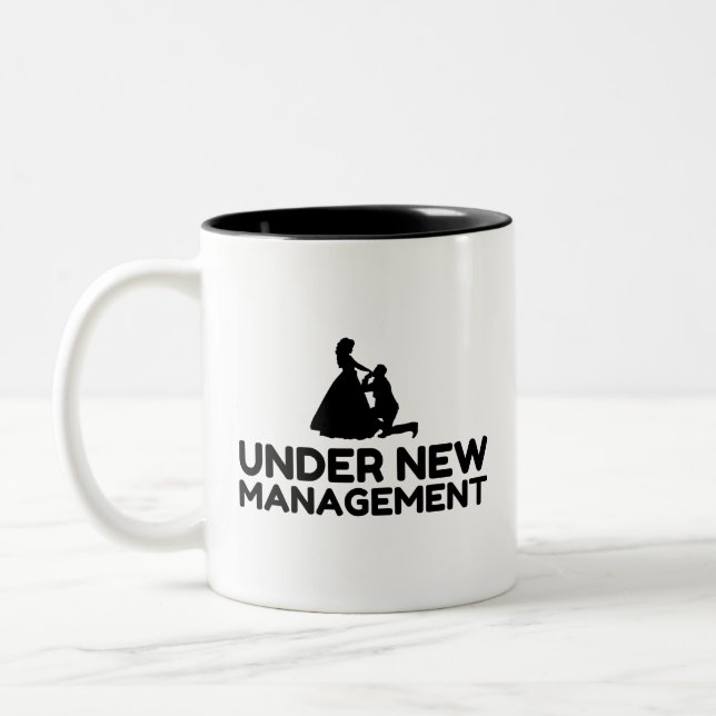 unter neuer Leitung Zweifarbige Tasse (Links)