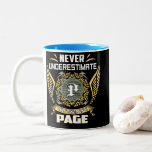 Unterschätze niemals die Macht einer Seite Zweifarbige Tasse