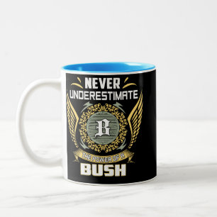 Unterschätze niemals die Macht eines Busches Zweifarbige Tasse