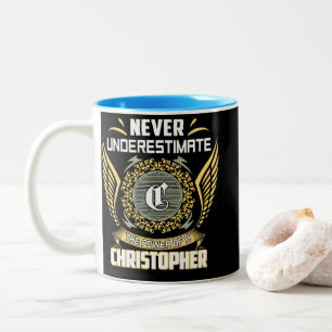 Unterschätze niemals die Macht eines Christopher Zweifarbige Tasse