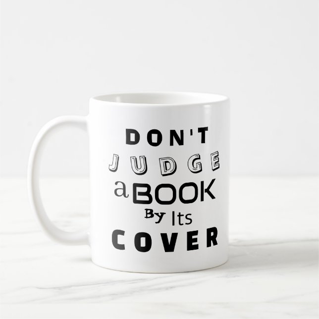 "Urteile ein Buch nicht nach seinem Cover" Kaffeetasse (Links)