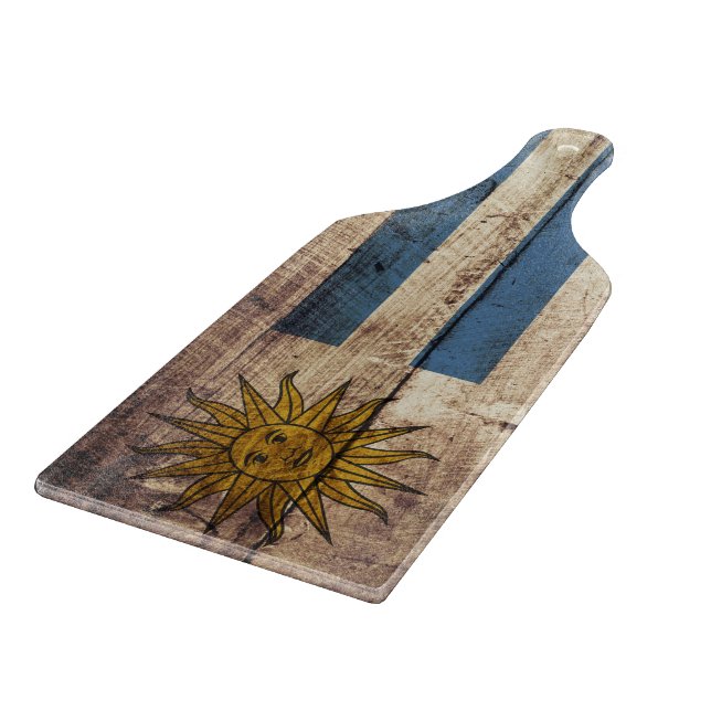 Uruguay-Flagge auf altem hölzernem Korn Schneidebrett (Ecke)
