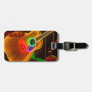 USA, Texas, Austin. Neon-Gitarre bei Erpressung Gepäckanhänger